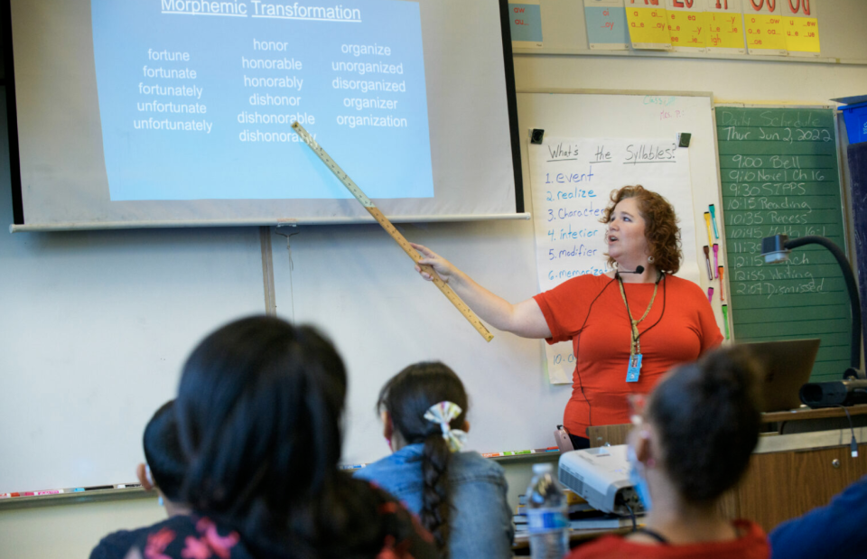 Teacher Patty Papalias conducts a reading lesson in her 3rd/4th class at Ethel I. Baker Elementary School in Sacramento in June 2022.