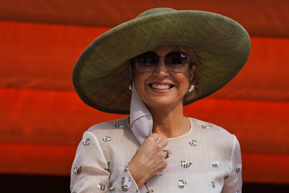 Queen Maxima poses for photographs at the Netherlands pavilion at Expo 2020 in Dubai, United Arab Emirates, Wednesday, Nov. 3, 2021. King Willem-Alexander and Queen Maxima of the Netherlands are in the United Arab Emirates as part of a royal trip to the country to visit Dubai's Expo 2020. (AP Photo/Jon Gambrell)