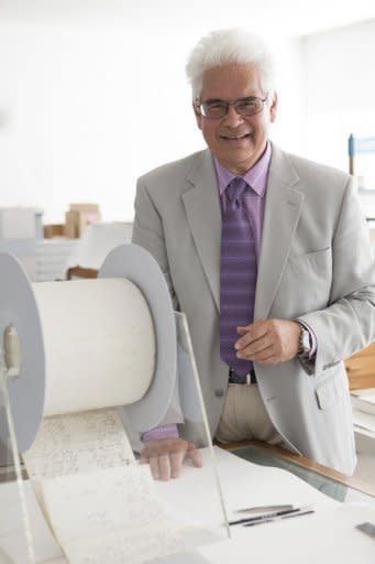 File photo released by manipula.co.nz shows author Ray Waru inspecting files at New Zealand's national archives in Wellington, on December 7, 2012, following the release of his new book about rare historical gems buried in the archives, including a bizarre WWII plan to create a "tsunami bomb" and military X-Files detailing supposed UFO sightings