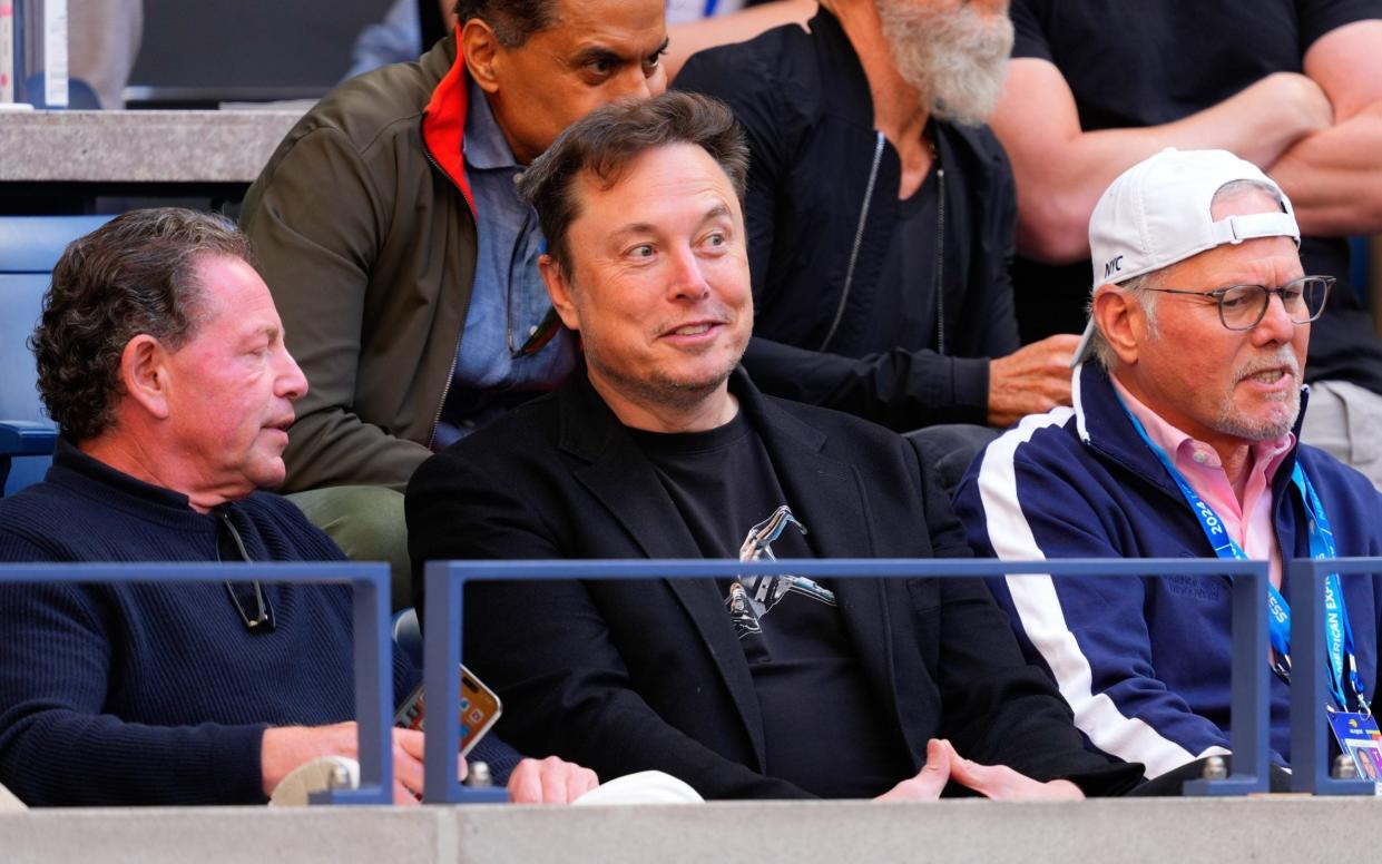 The Tesla chief executive was among a host of celebrities at the Arthur Ashe Stadium