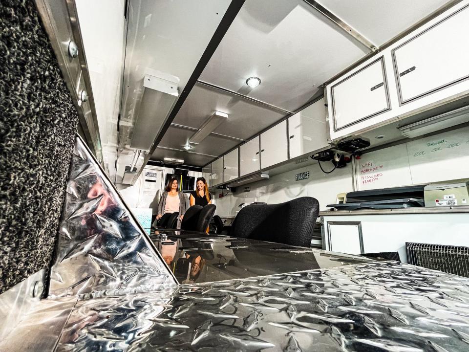 Salt Lake County Mayor Jenny Wilson, left, tours a mobile command center set up at Wheeler Historic Farm on Monday.