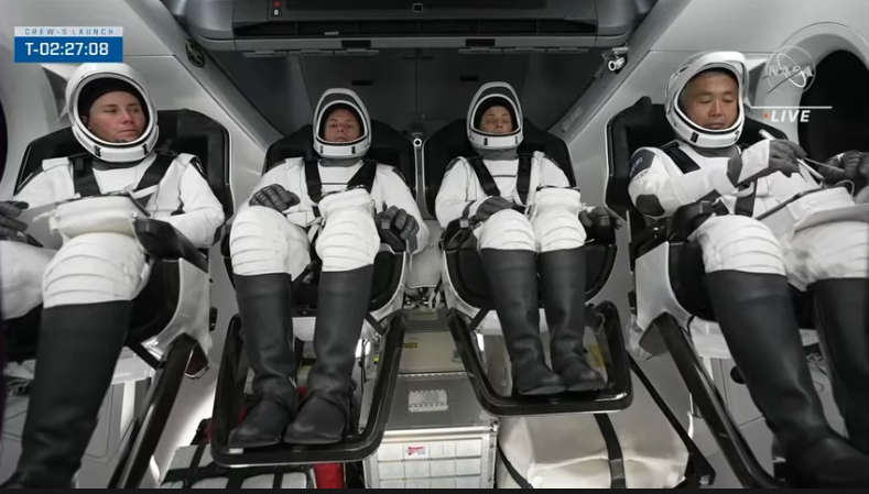 From left to right: Russia's Anna Kikina, NASA's Josh Cassada and Nicole Mann, and Japan's Koichi Wakata are seen in Crew Dragon on Wednesday, Oct. 5, 2022.