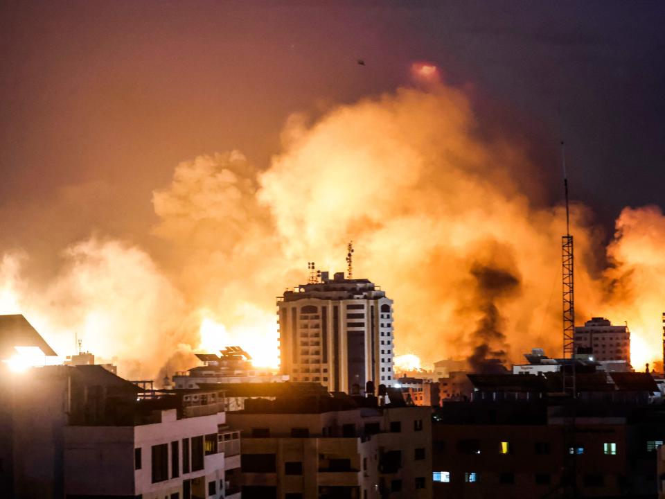 A fireball erupts during Israeli bombardment of Gaza City on October 9, 2023.