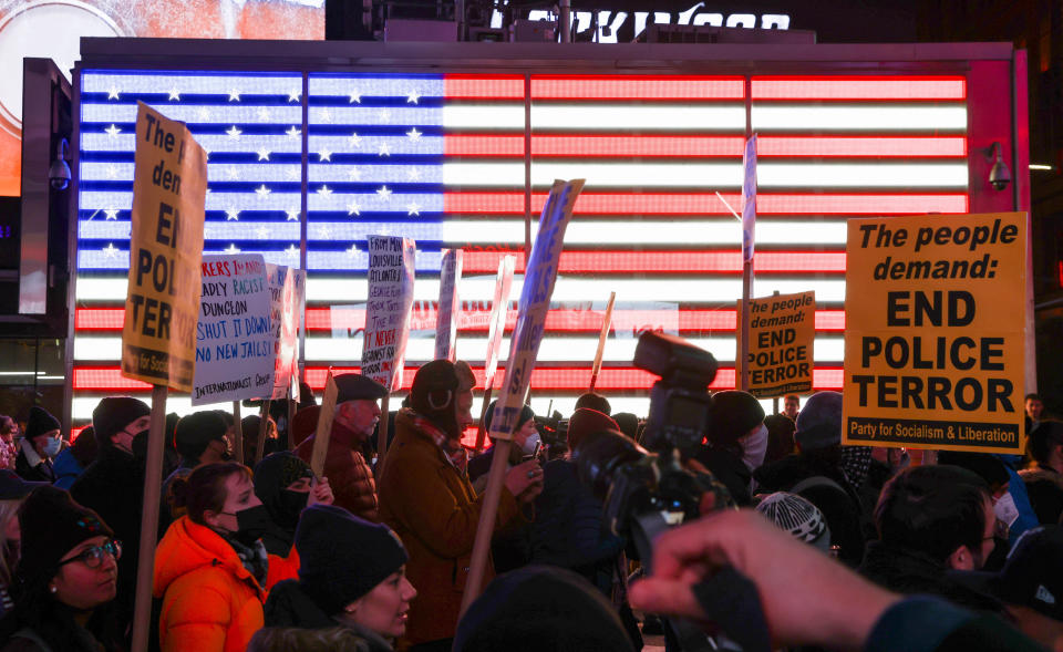 Demonstrators protest in Times Square