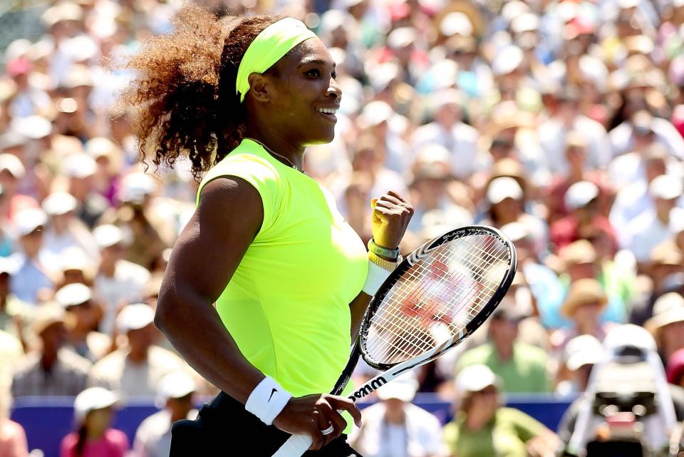 Serena Williams celebrates match point at the Bank of the West Classic in 2012.