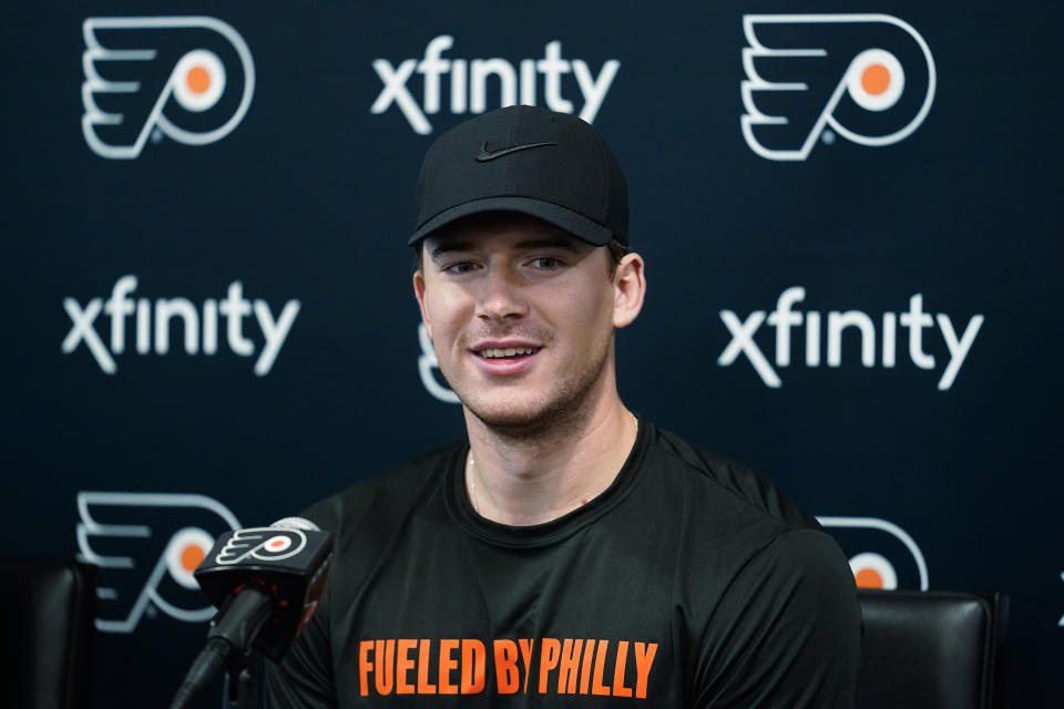 Philadelphia Flyers' Carter Hart speaks with members of the media during training camp at the NHL hockey team's practice facility, Thursday, Sept. 22, 2022, in Voorhees, N.J. (AP Photo/Matt Rourke)