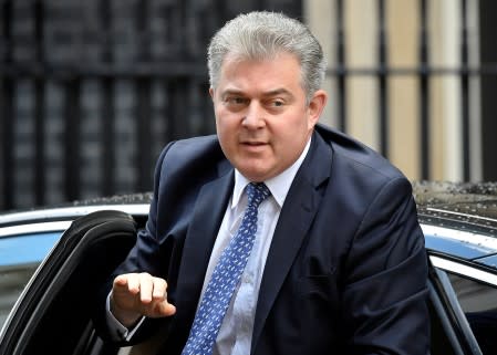 FILE PHOTO: Britain's Conservative Party Chairman Brandon Lewis is seen outside Downing Street ahead of a Brexit vote in London