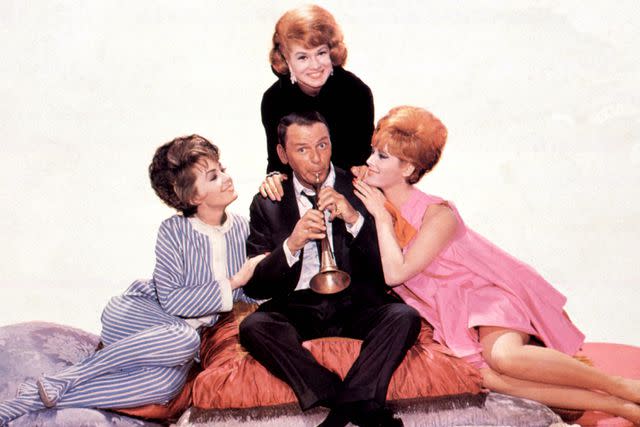 <p>Moviestore/Shutterstock</p> Frank Sinatra, Barbara Rush, Phyllis Mcguire and Jill St John in 'Come Blow Your Horn'