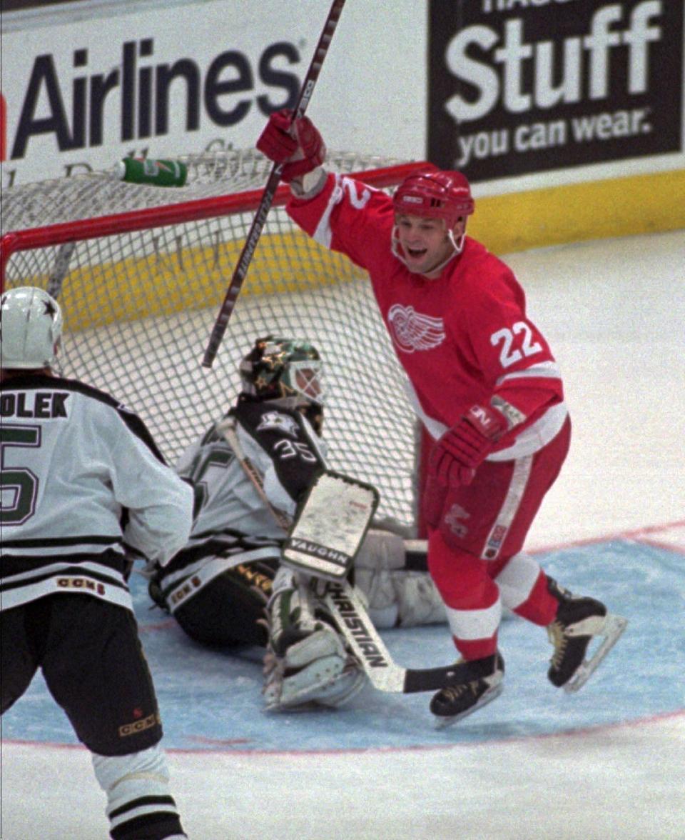 1994-95: The Red Wings finished 33-11-4 in a lockout-shortened season, winning the President's Trophy, but losing in the Stanley Cup Finals in four games to the New Jersey Devils. Pictured is Dino Ciccarelli.