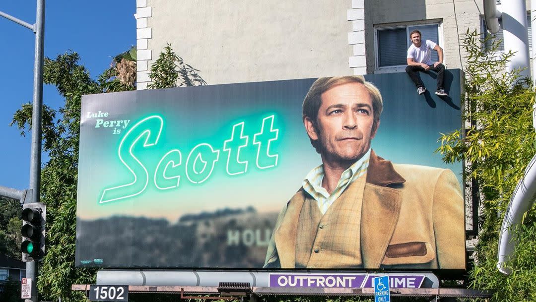 Luke Perry's son, Jack, climbed atop an L.A. billboard featuring his late dad in character as Scott Lancer in Quentin Tarantino's new film "Once Upon a Time in Hollywood." Jack, a wrestler, wrote, "He deserved this, and I’m very proud of it." (Photo: boy_myth_legend via Instagram)
