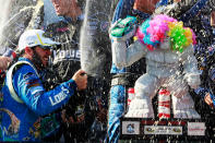 DOVER, DE - JUNE 03: Jimmie Johnson, driver of the #48 Lowe's Madagascar Chevrolet, celebrates in Victory Lane after winning the NASCAR Sprint Cup Series FedEx 400 benefiting Autism Speaks at Dover International Speedway on June 3, 2012 in Dover, Delaware. (Photo by Geoff Burke/Getty Images)