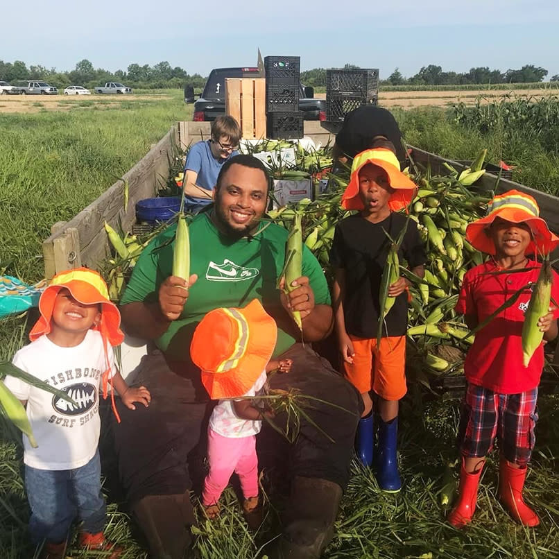 The Brown children with Jason on the farm