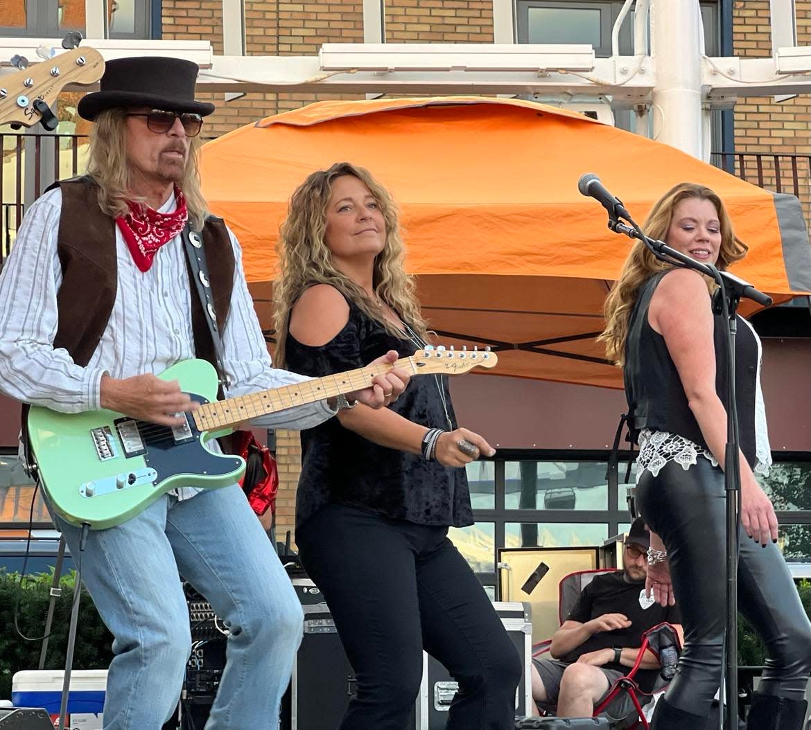 Tim Eastgate does his Tom Petty impersonation during the King's Highway tribute band concert on Friday at Centennial Plaza during the Downtown Canton Music Fest.