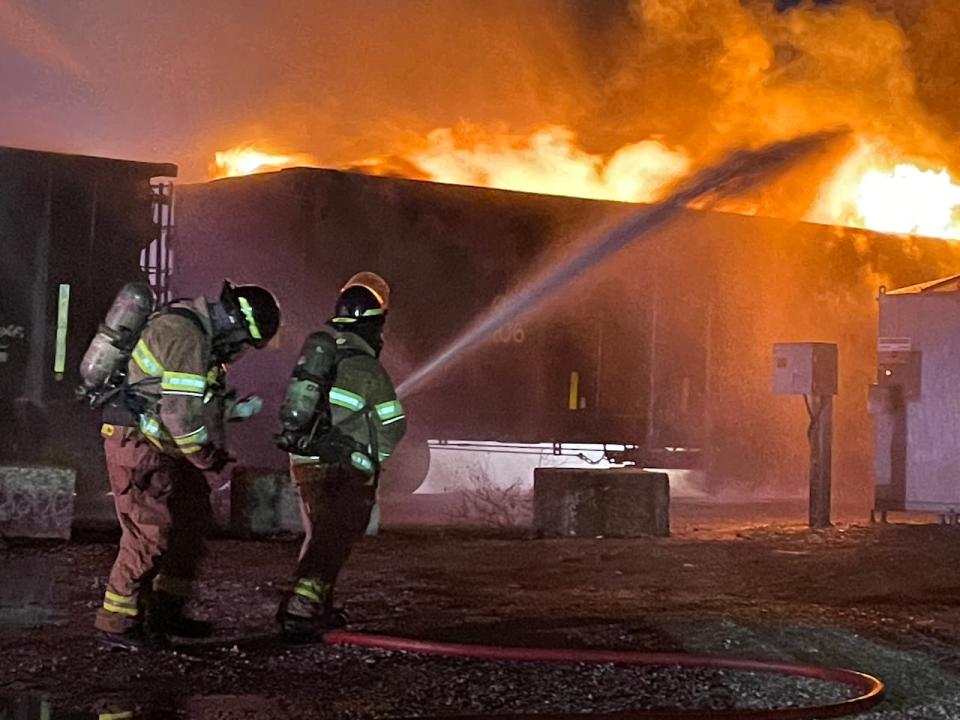 There were no dangerous goods on board the freight train when it caught fire, London Fire says. 