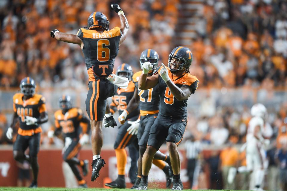Tennessee linebacker Aaron Beasley (6) and Tennessee defensive lineman Tyler Baron (9) celebrate on the field during a football game between Tennessee and Austin Peay at Neyland Stadium in Knoxville, Tenn., on Saturday, Sept. 9, 2023.