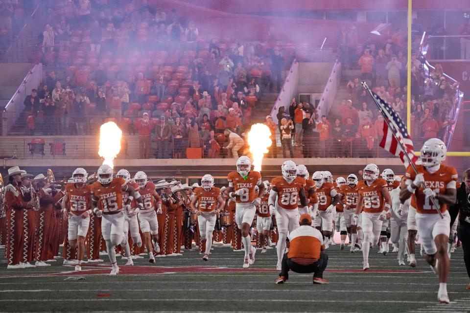 Nov 24, 2023; Austin, Texas, USA; Texas Longhorns take the field before a game against the Texas Tech Red Raiders at Darrell K Royal-Texas Memorial Stadium. Mandatory Credit: Scott Wachter-USA TODAY Sports