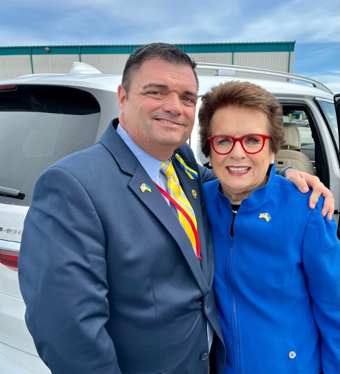 Asheville Regional Sports Commission executive director Demp Bradford (left) poses with Billie Jean King during the 2022 Billie Jean King Cup qualifying tie hosted in Asheville.