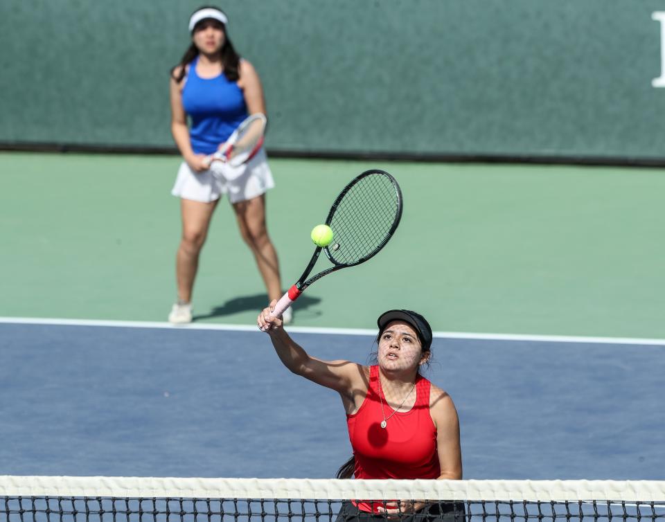 Mia Castillo, right, and Lorena Parra-Hernandez of Indio High School play in the Desert Valley League doubles championship at Palm Valley Country Club in Palm Desert, Calif., Oct. 16, 2023.