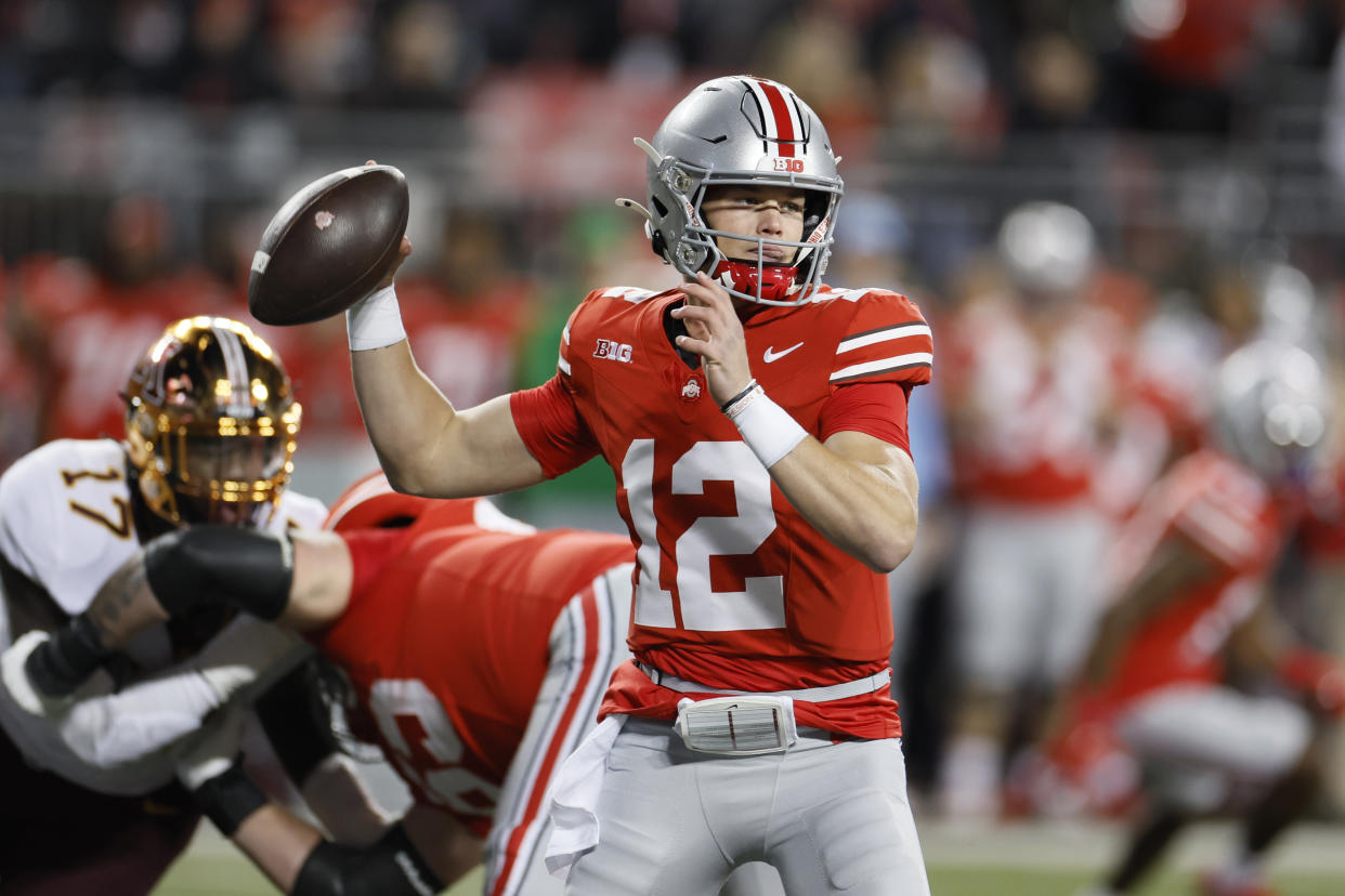 Ohio State quarterback Lincoln Kienholz plays against Minnesota during an NCAA college football game Saturday, Nov. 18, 2023, in Columbus, Ohio. (AP Photo/Jay LaPrete)