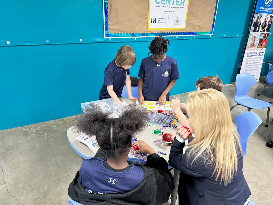 Children interact with new STEM-focused games at the South Knoxville Boys & Girls Vestal Club.