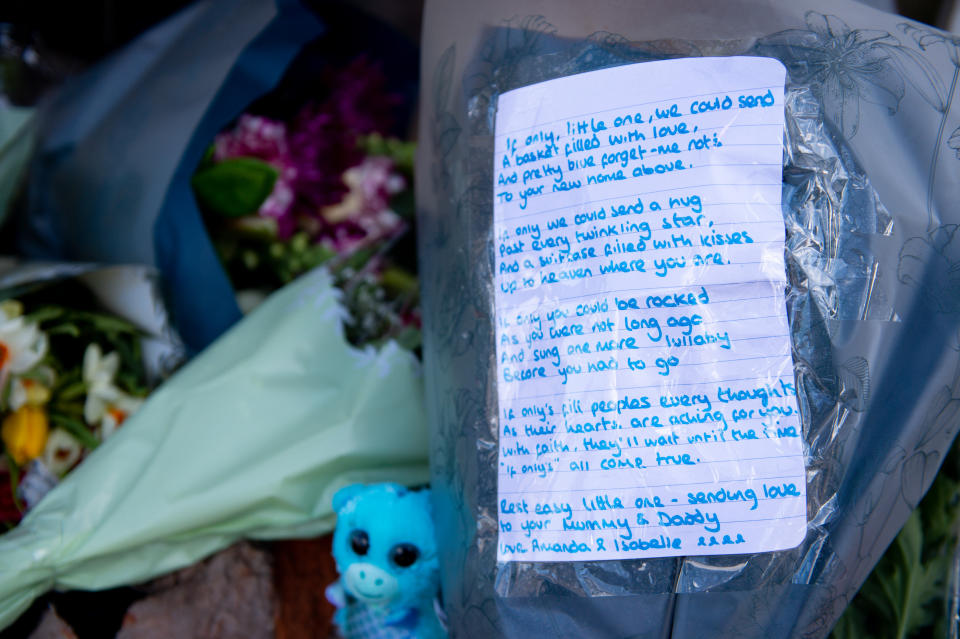 A tribute left by a mourner with a bunch of flowers for Ciaran Leigh Morris.