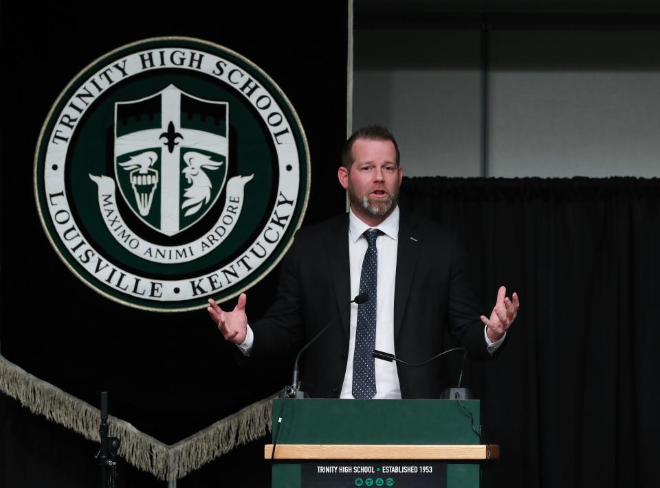 Former Trinity High School and U of L QB Brian Brohm talks during the Trinity High School Hall of Fame induction ceremony Thursday night.
