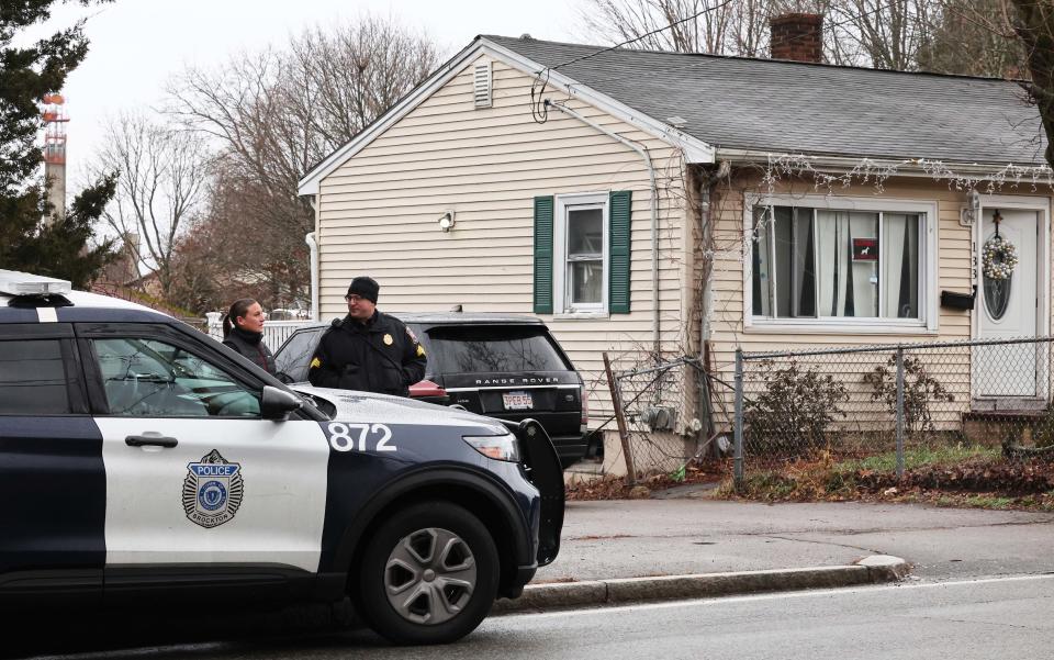 Brockton police investigate on East Ashland Street after a nearby shooting on River Street on Thursday, Dec. 15, 2022.