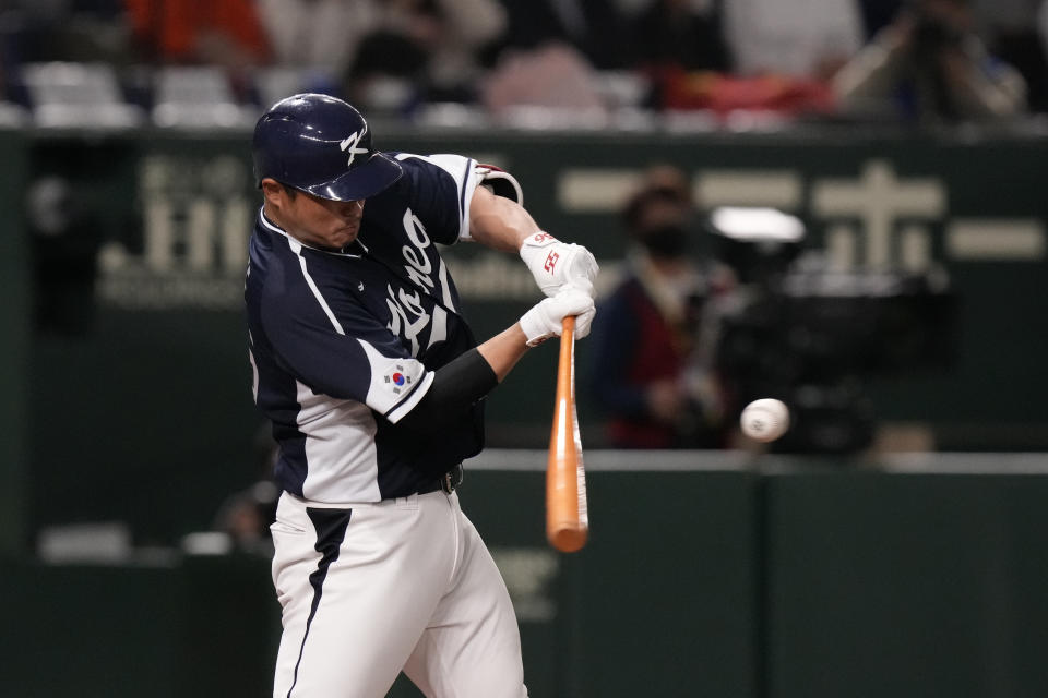 South Korea's Lee Ji-young hits a single during the fourth inning of the first round Pool B game between the South Korea and China at the World Baseball Classic (WBC) at Tokyo Dome in Tokyo, Japan, Monday, March 13, 2023. (AP Photo/Eugene Hoshiko)