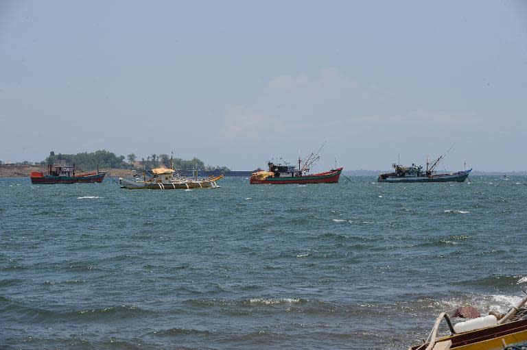 File photo shows fishing boats anchored off Santa Cruz bay, Zambales province, near the South China Sea on May 10, 2012, after arriving from the Scarborough Shoal