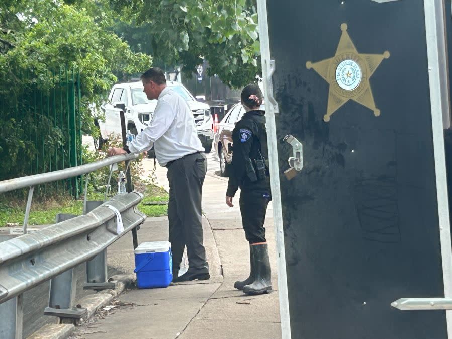 Authorities search the area near Matthew Torres’ apartment, where he was shot and killed on May 17, 2024. (KXAN Photo/Frank Martinez)