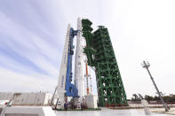 In this photo provided by Korea Aerospace Research Institute via Yonhap, the Nuri rocket, the first domestically produced space rocket, sits on its launch pad at the Naro Space Center in Goheung, South Korea, Wednesday, Oct. 20, 2021. South Korea was preparing to test-launch its first domestically produced space rocket Thursday, Oct.21, in what officials describe as an important step in its pursuit of a satellite launch program. (Korea Aerospace Research Institute/Yonhap via AP)