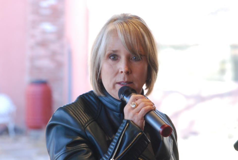 FILE - In this Nov. 14, 2019, file photo, New Mexico Gov. Michelle Lujan Grisham talks at the Randall Davey Audubon Center on the outskirts of Santa Fe, N.M. At least half a dozen U.S. governors, all Democrats, are heading to the U.N. climate conference in Glasgow, Scotland, to tout their state's climate progress at a critical moment in the United States' efforts to ramp down carbon emissions. (AP Photo/Morgan Lee, File)