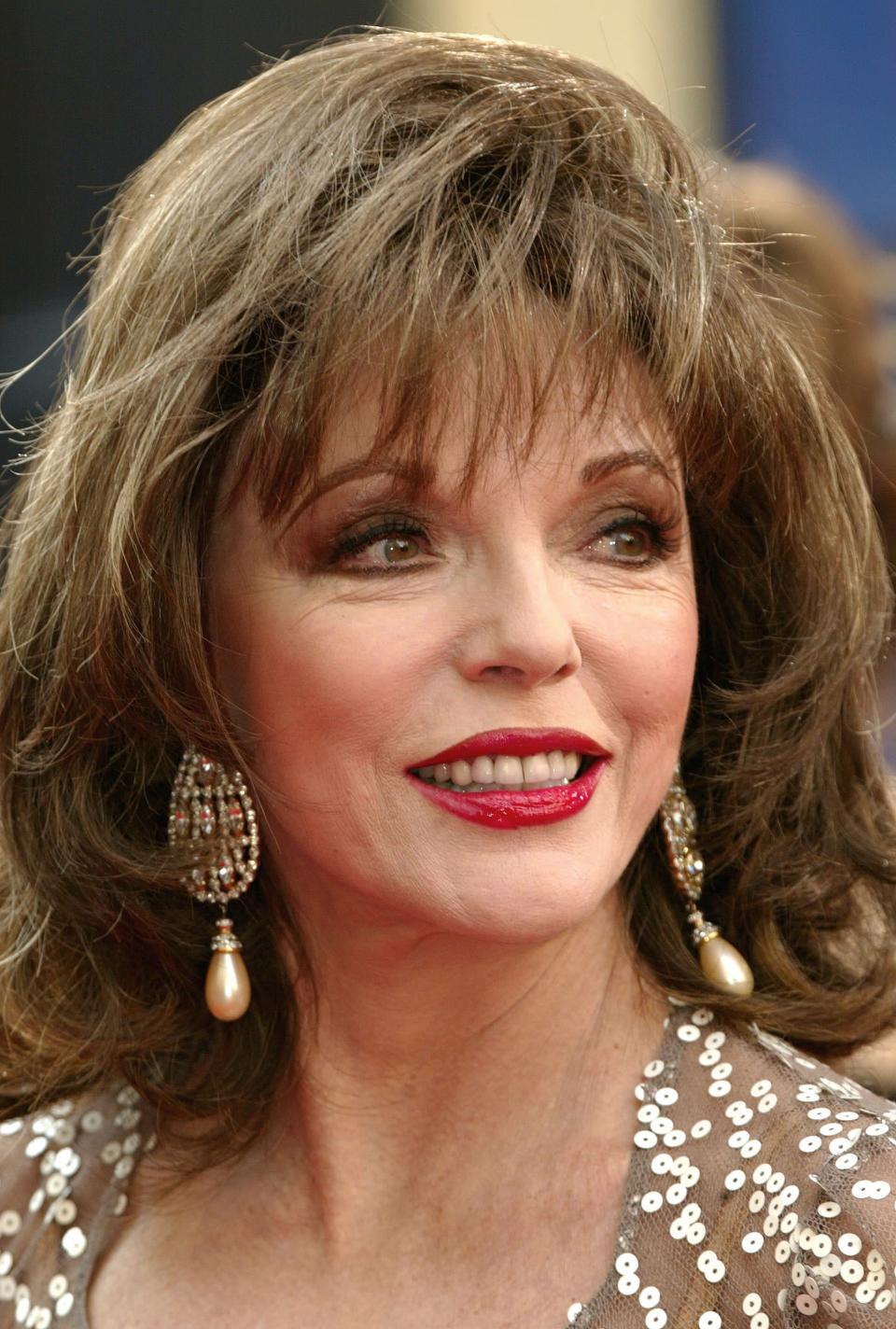 joan collins jewellery -  Sion Touhig/Getty Images