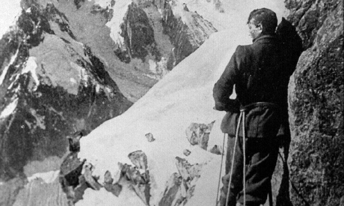 <span>George Mallory on the Moine Ridge of the Aiguille Verte mountain in France.</span><span>Photograph: Herald Sun/EPA</span>