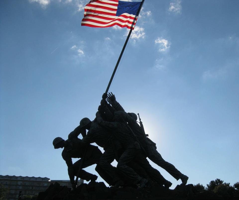 The U.S. Marine Corps War Memorial in Arlington County, Virginia, was inspired by the iconic 1945 photograph of six Marines raising a U.S. flag during the World War II Battle of Iwo Jima. Troop 40 Scoutmaster Don E. Scheerer stood 25 feet away when the flag was raised.