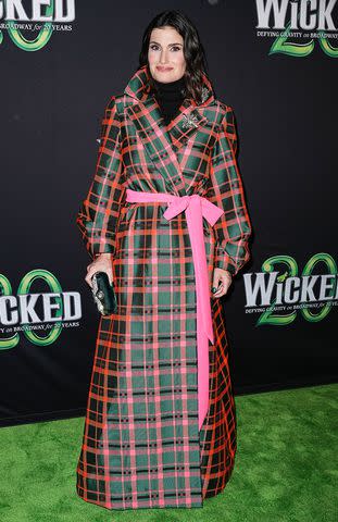 <p>John Nacion/Getty</p> Idina Menzel attends the 'Wicked' celebration of 20 years on Broadway in New York City.