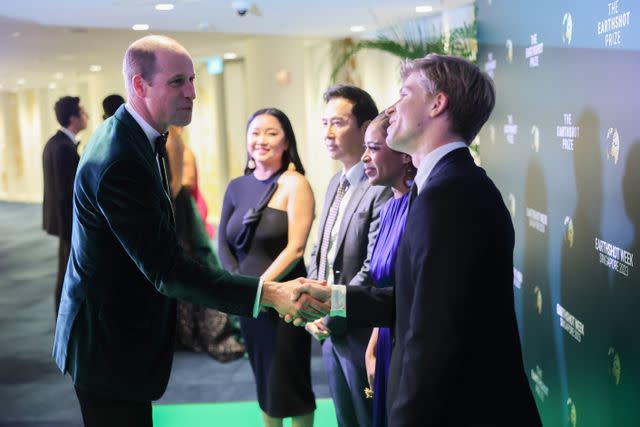 <p>Chris Jackson/Getty</p> Prince William and Robert Irwin shaking hands at the 2023 Earthshot Prize Awards Ceremony on November 07, 2023 in Singapore