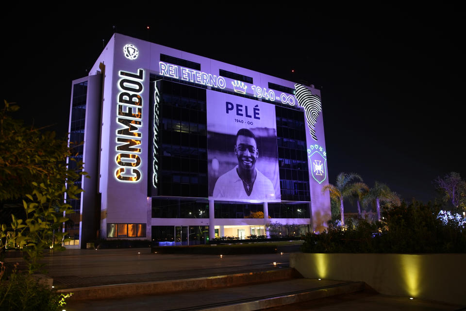 ASUNCION, PARAGUAY - DECEMBER 29: In this handout image provided by CONMEBOL a large flag with the image of late football legend Pele is displayed as a tribute at CONMEBOL headquarters building on December 29, 2022 in Asunción, Paraguay. Brazilian football icon Edson Arantes do Nascimento, better known as Pele, died on December 29, 2022 aged 82 after a battle with cancer in Sao Paulo, Brazil. The three-time World Cup champion with Brazil is considered one of the greatest football legends of all time.  (Photo by CONMEBOL via Getty Images)