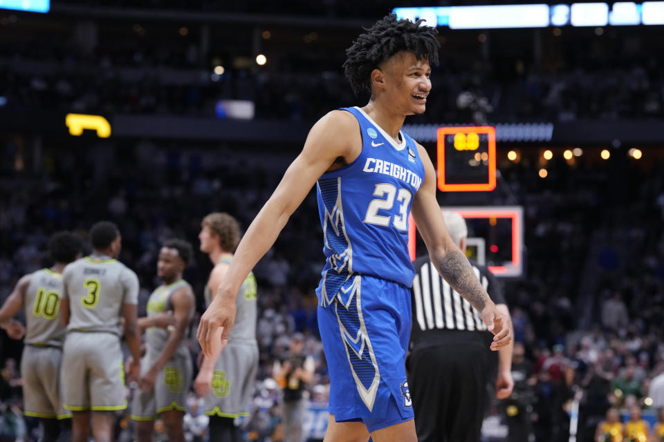 Creighton guard Trey Alexander celebrates the team's impending win over Baylor in a second-round college basketball game in the men's NCAA Tournament on Sunday, March 19, 2023, in Denver. (AP Photo/David Zalubowski)