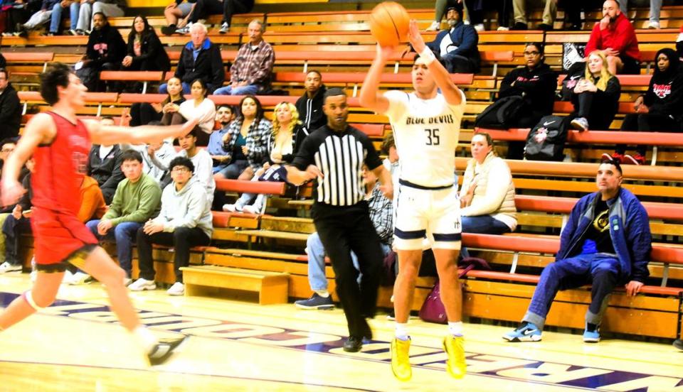 Merced College sophomore Mateo Tangaan attempts a three-pointer during a 124-108 loss to Fresno City on Wednesday, Jan. 10, 2024 at Don Reid Court.