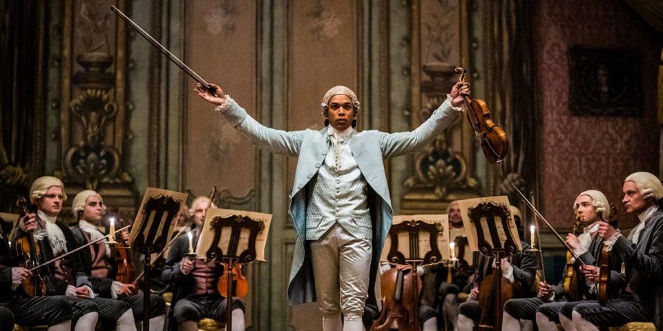 Kelvin Harrison Jr. (center) plays French violinist and composer Joseph Bologne in the musical period drama "Chevalier."