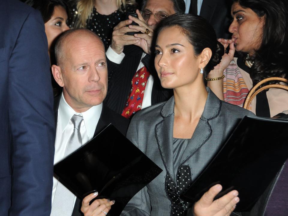 Emma Heming Willis and Bruce Willis at Paris Fashion Week in 2010.