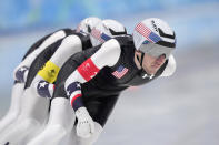 Team United States, led by Casey Dawson, with Emery Lehman center, Ethan Cepuran, compete during the speedskating men's team pursuit semifinals at the 2022 Winter Olympics, Tuesday, Feb. 15, 2022, in Beijing. (AP Photo/Sue Ogrocki)