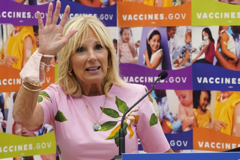 FILE - First lady Jill Biden waves as she speaks during a tour of a health facility, July 1, 2022, in Richmond, Va. Jill Biden is apologizing for saying Latinos are "as unique" as San Antonio breakfast tacos. Through a spokesperson, the first lady apologized Tuesday for "words that conveyed anything but pure admiration and love for the Latino community." Jill Biden was in San Antonio on Monday to address the annual conference of UnidosUS, a Latino civil rights and advocacy group. (AP Photo/Steve Helber, File)