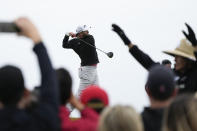 Jon Rahm, of Spain, watches his tee shot on the fourth hole of the South Course at Torrey Pines during the final round of the Farmers Insurance Open golf tournament, Saturday, Jan. 28, 2023, in San Diego. (AP Photo/Gregory Bull)