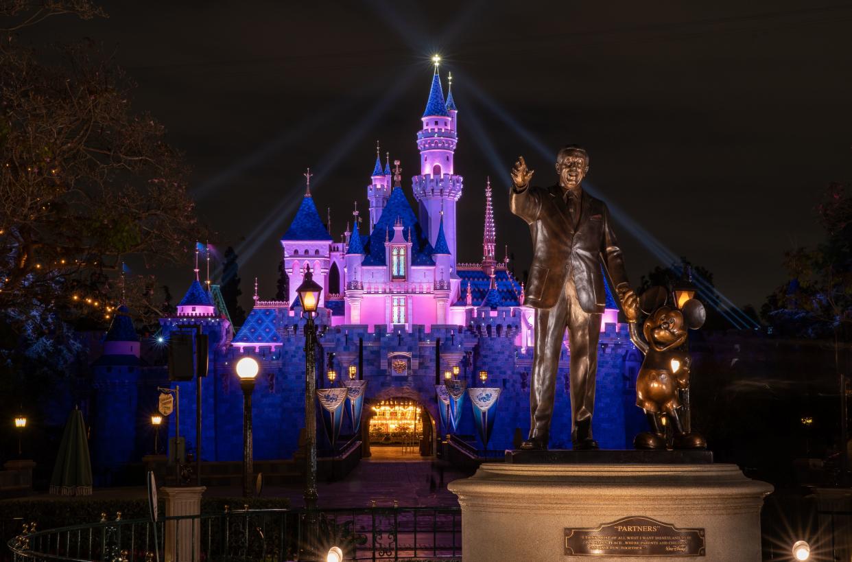 In this handout photo provided by Disneyland Resort, a view of Sleeping Beauty Castle in Disneyland Park illuminated during a special live-streamed moment to welcome Cast Members back to the resort on April 26, 2021, at Disneyland Resort in Anaheim, Calif. Disneyland Resort theme parks will reopen to guests on Friday, April 30, 2021.