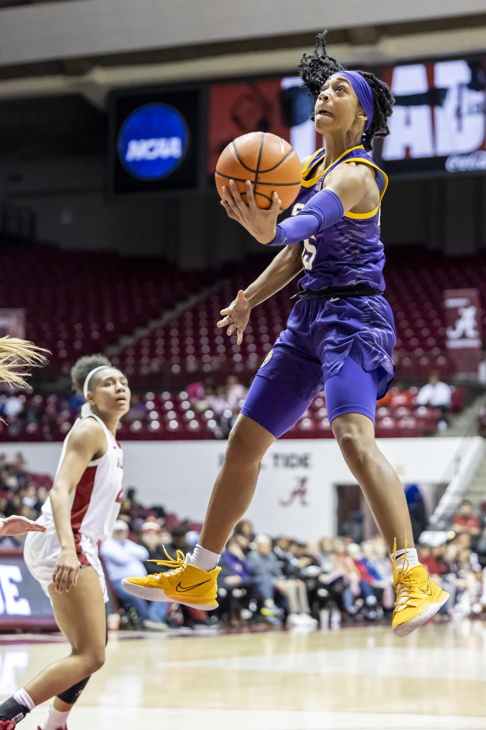 LSU guard Alexis Morris, right, shoots against Alabama during the first half of an NCAA college basketball game, Monday, Jan. 23, 2023, in Tuscaloosa, Ala. (AP Photo/Vasha Hunt)