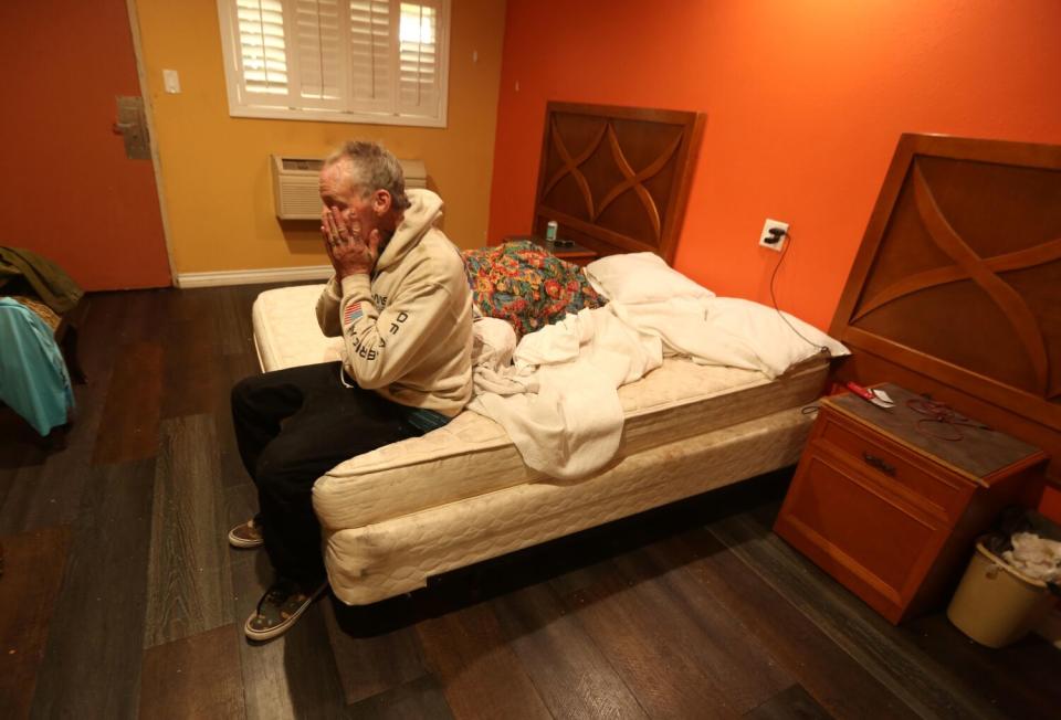 Daniel Loughlin as he sits in his room at the Los Angeles Inn and Suites.