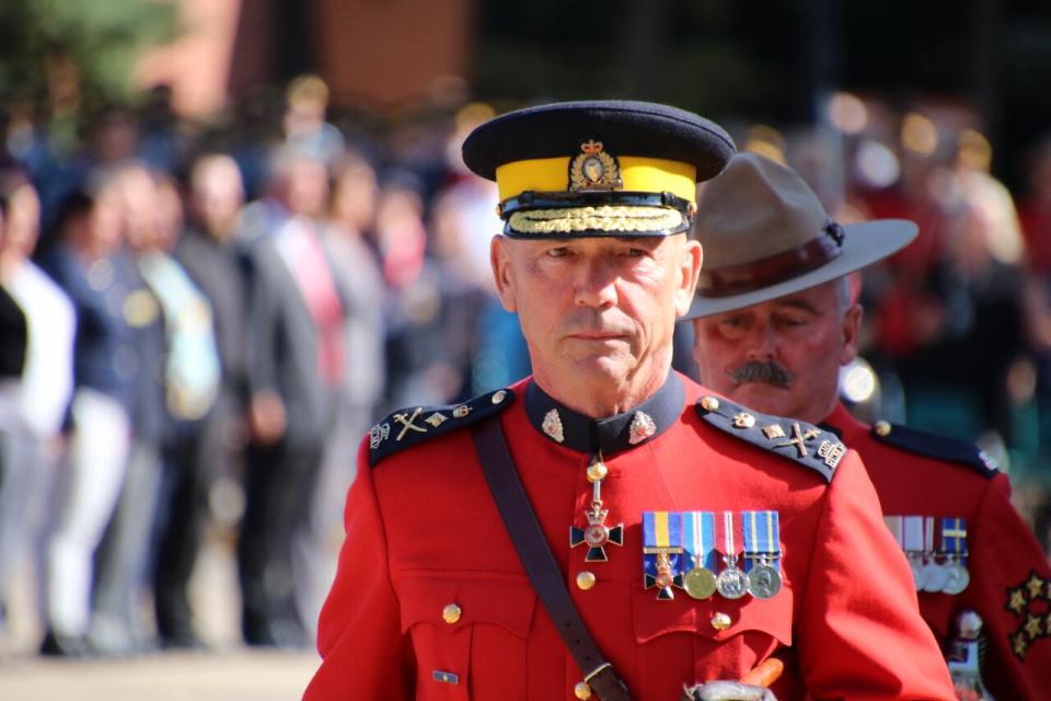 Former RCMP commissioner Bob Paulson inspects troops for the last time during the change of command ceremony on September 6 at the RCMP Heritage Centre in Regina.