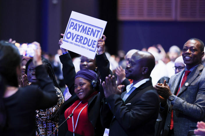 A placard is displayed at an informal session of the U.N. Climate Change Conference in Sharm el-Sheikh, Egypt,